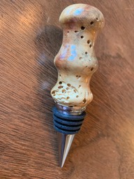 Worm holes in a wine stopper!